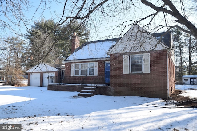 view of front facade with an outbuilding