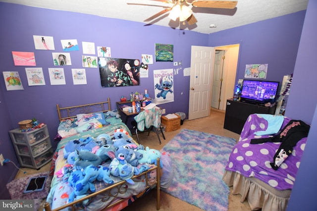 carpeted bedroom with ceiling fan