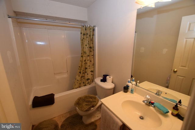 full bathroom featuring toilet, tile patterned floors, vanity, and shower / tub combo with curtain