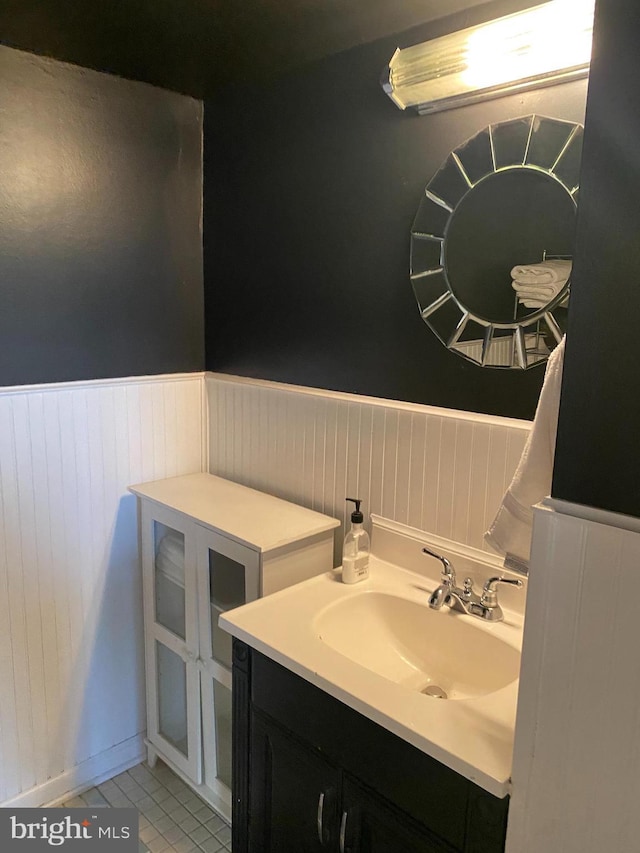 bathroom with vanity and tile patterned flooring