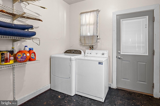 clothes washing area with independent washer and dryer