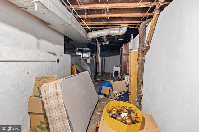 basement featuring heating unit