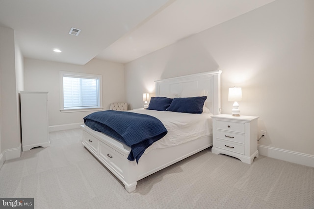 bedroom with recessed lighting, visible vents, baseboards, and light colored carpet