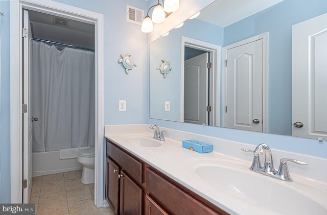 full bathroom with toilet, shower / tub combo with curtain, and vanity