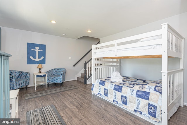 bedroom with hardwood / wood-style floors