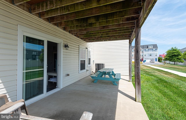 view of patio with central AC unit