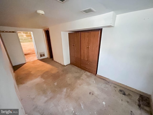 unfurnished bedroom featuring a closet