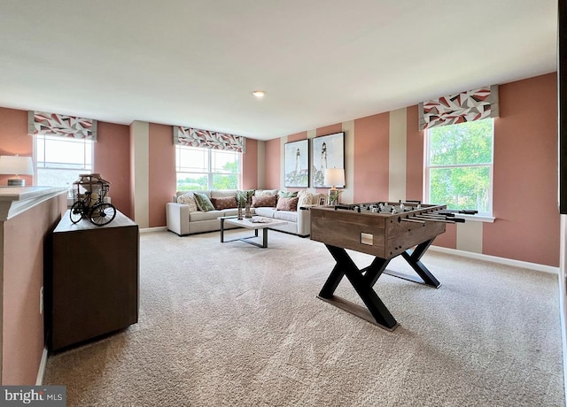 playroom featuring light colored carpet