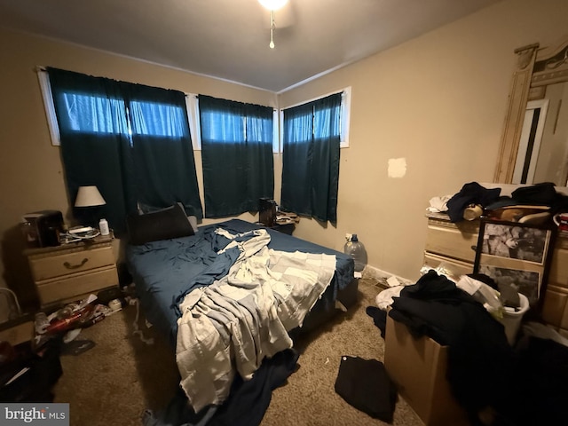 bedroom featuring carpet floors and ceiling fan