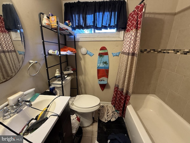 full bathroom with toilet, vanity, tile patterned flooring, and shower / bath combo