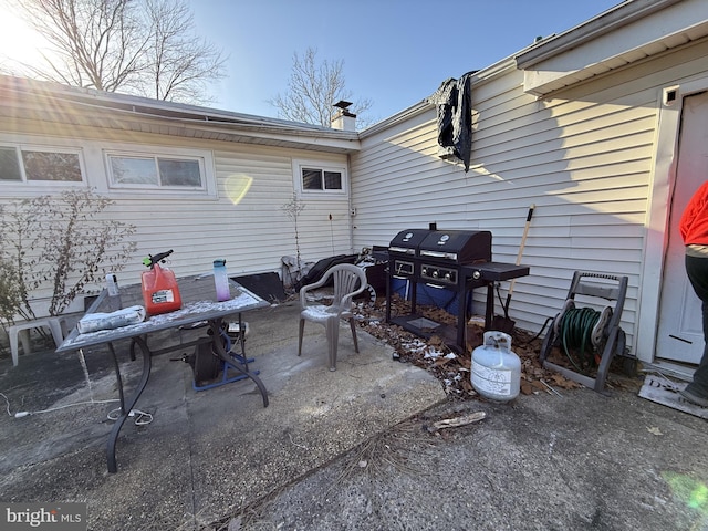 view of patio featuring a grill