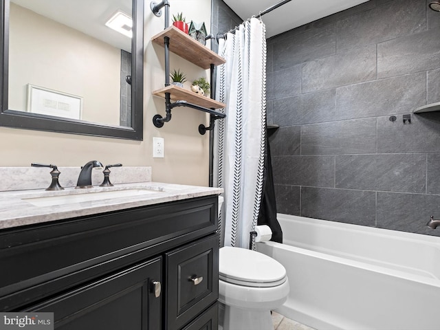 full bathroom featuring toilet, vanity, and shower / tub combo with curtain