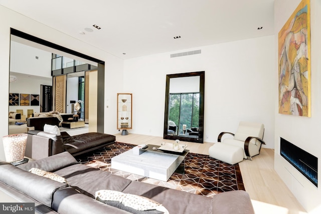 living room with hardwood / wood-style flooring