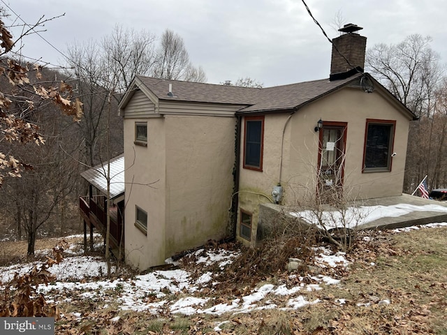 view of snow covered property