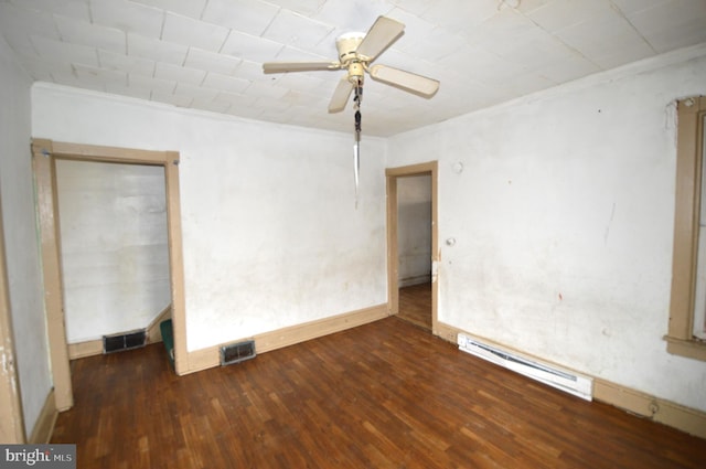 unfurnished room with ornamental molding, baseboard heating, dark hardwood / wood-style flooring, and ceiling fan