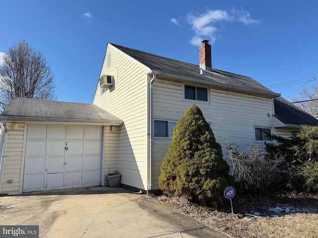 view of property exterior featuring a garage