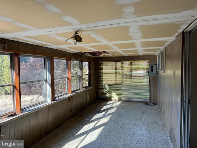 unfurnished sunroom featuring a healthy amount of sunlight