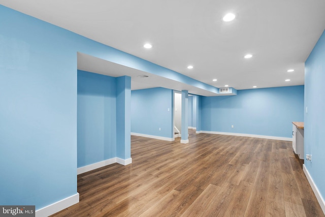 basement with wood-type flooring