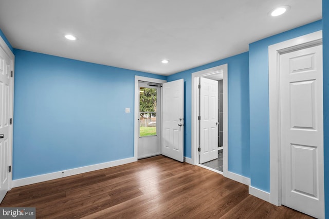 interior space with dark wood-type flooring