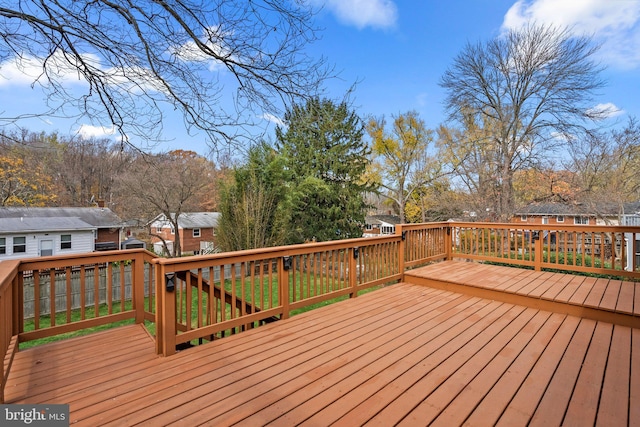 deck featuring a yard