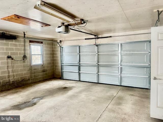 garage with a garage door opener