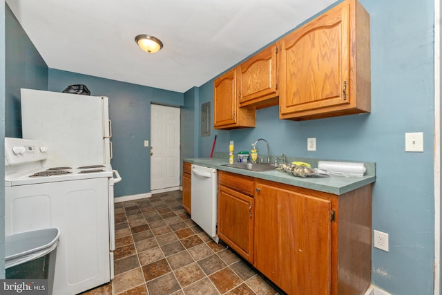 kitchen with sink and white appliances