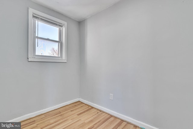 unfurnished room with light hardwood / wood-style floors