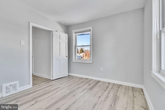 unfurnished bedroom with light hardwood / wood-style flooring