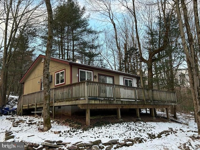 view of front of home with a wooden deck