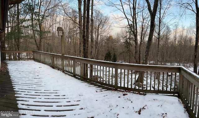 view of snow covered deck