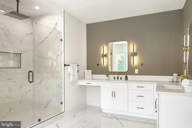 bathroom with vanity and an enclosed shower