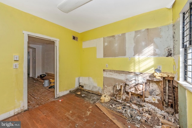 miscellaneous room with hardwood / wood-style floors