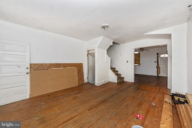 bonus room with dark hardwood / wood-style floors