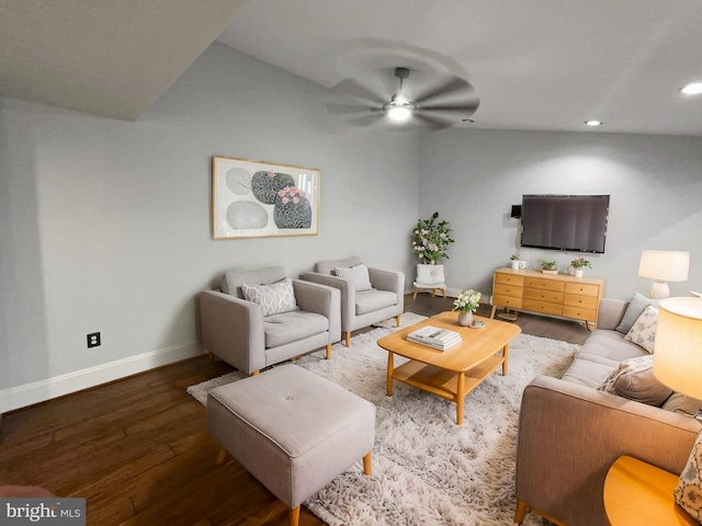 living room with ceiling fan and hardwood / wood-style flooring