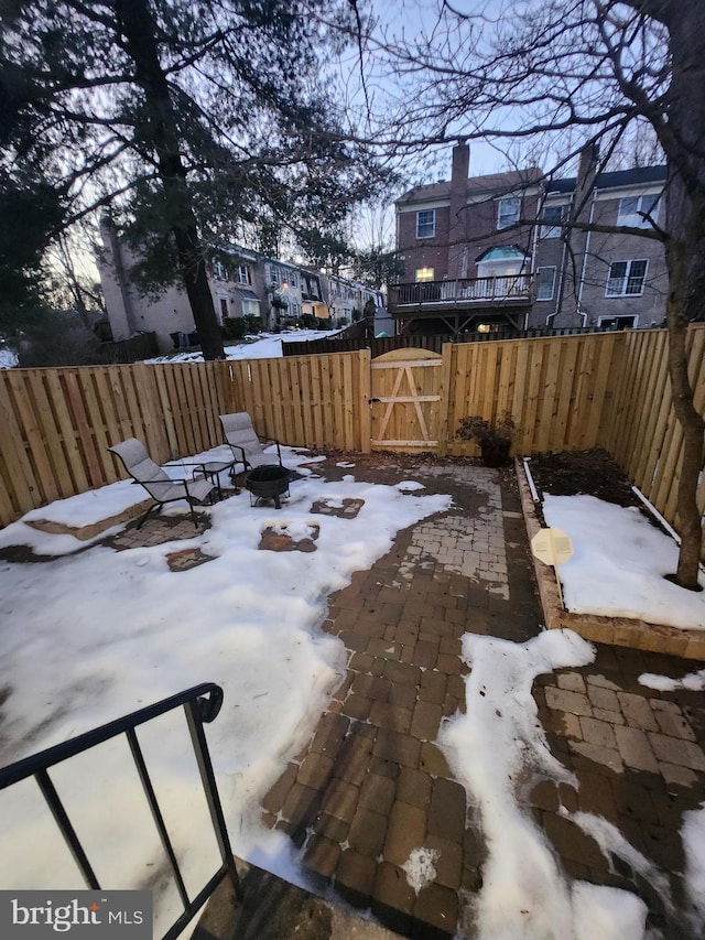 exterior space featuring an outdoor fire pit