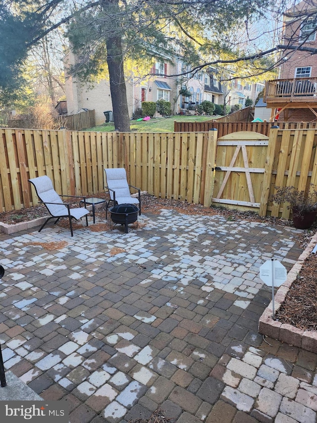 view of patio / terrace featuring a fire pit