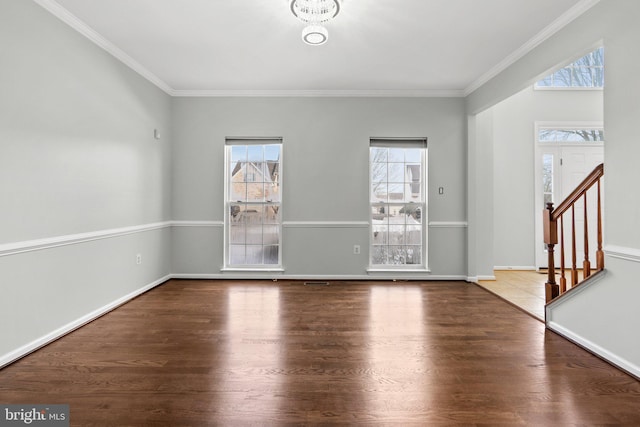interior space featuring hardwood / wood-style flooring and ornamental molding