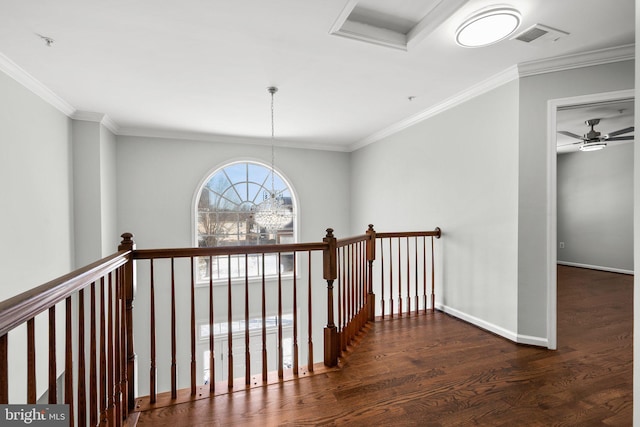 corridor with crown molding and dark wood-type flooring