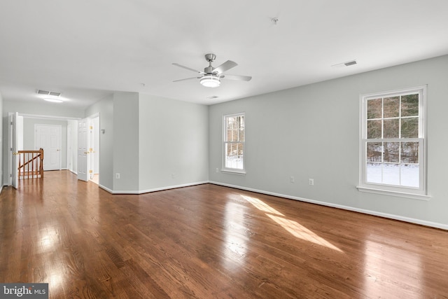 unfurnished room with ceiling fan and hardwood / wood-style floors