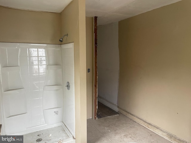 bathroom featuring walk in shower