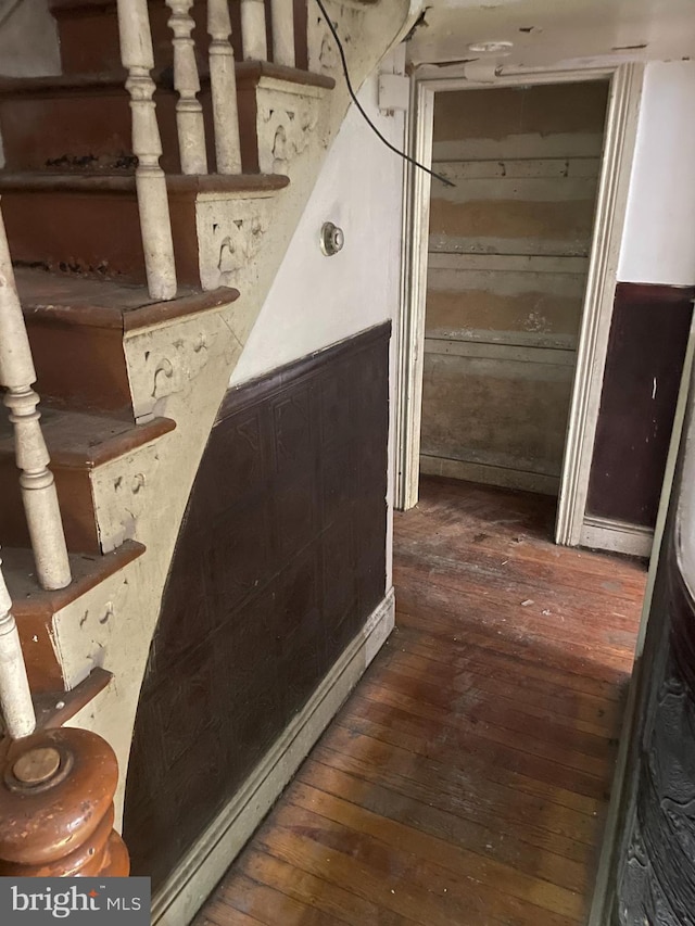 bathroom with hardwood / wood-style floors