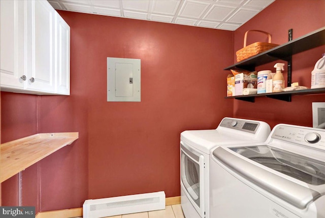 washroom with cabinet space, light tile patterned floors, electric panel, an ornate ceiling, and washer and dryer