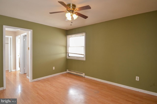 unfurnished room with a baseboard heating unit, ceiling fan, and light hardwood / wood-style flooring