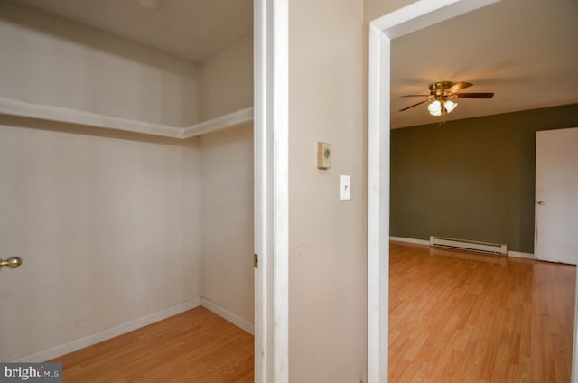 interior space featuring baseboard heating