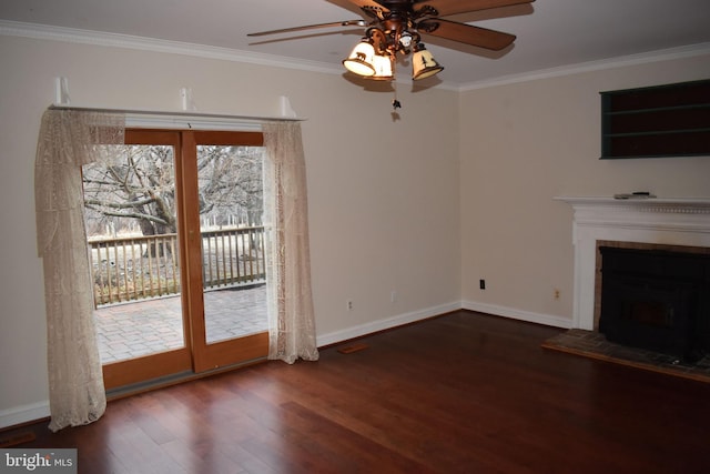 unfurnished living room featuring crown molding, dark wood-type flooring, and ceiling fan