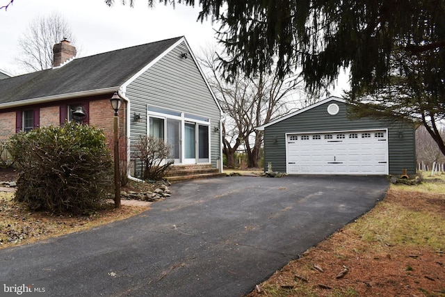 view of property exterior featuring a garage