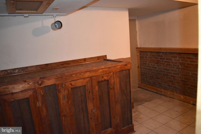 interior space featuring light tile patterned floors