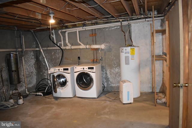 basement with washer and dryer and electric water heater