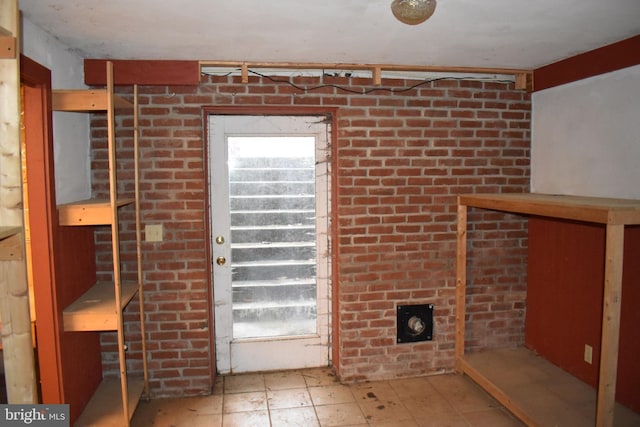 interior space with brick wall