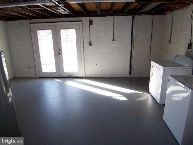 basement with separate washer and dryer and french doors